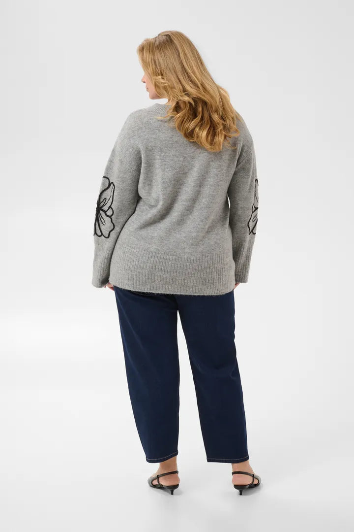 Pullover mit Applikationen