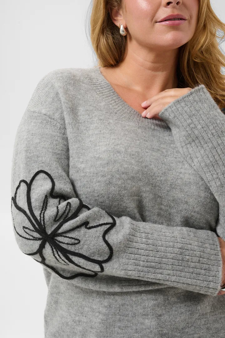 Pullover mit Applikationen