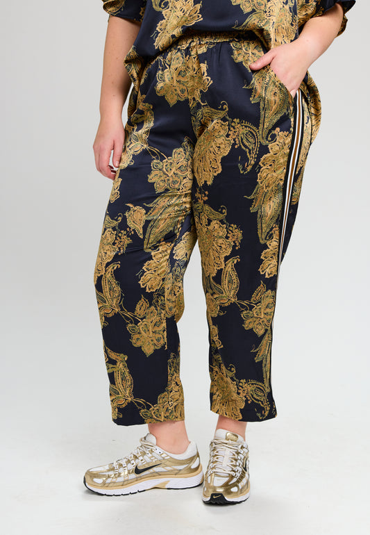 Gemusterte Hose mit Galonstreifen